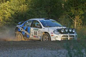 Bruce Davis / Jimmy Brandt set up for a hard-right at the SS14 spectator point in their Dodge SRT-4.