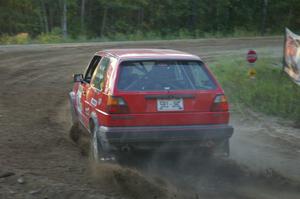 Paul Koll / Matt Wappler VW GTI comes onto the county road at the spectator point on SS14.