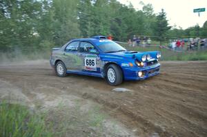 Heath Nunnemacher / Travis Hanson Subaru WRX on SS14 at the spectator point.