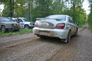 Tanner Foust / Chrissie Beavis Subaru WRX pulls away carefully from the start of SS16.