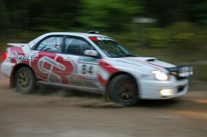 Greg Drozd / John Nordlie prepare for a hard-left on SS16 in their Subaru WRX.