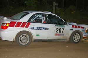 Dave Hintz / Rick Hintz at a 90-left on SS16 in their Subaru WRX.