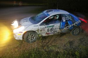 Bruce Davis / Jimmy Brandt at speed through a left-hander on SS16 in their Dodge SRT-4.