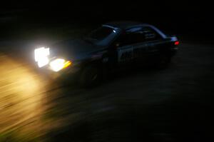 Martin Menning / Ryan Schnell through a 90-left on SS16 in their Subaru Impreza.