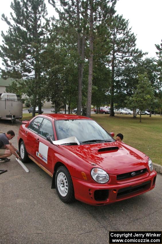 Dave Anton / Dominik Jozwiak Subaru WRX had a fresh coat of red paint after their crash at Maine Forest Rally.