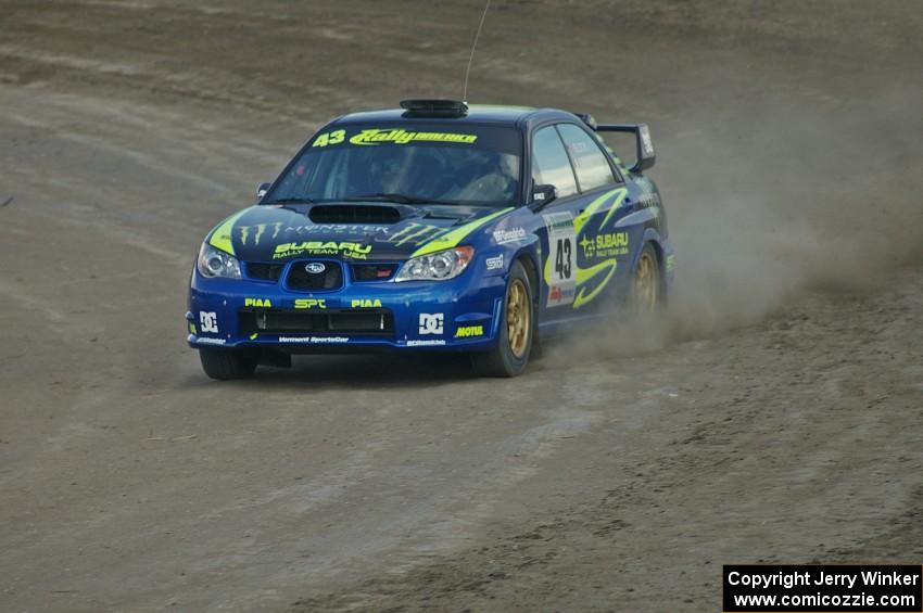 Ken Block / Alex Gelsomino Subaru	Impreza WRX STi at speed on the final corner of SS1 at Bemidji Speedway.