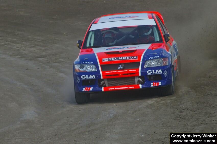 Alfredo DeDominicis / Massimo Daddovei come through the last corner of SS1 at Bemidji Speedway in the Mitsubishi Lancer Evo VII.