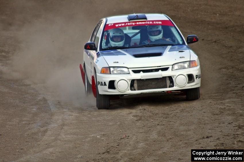 Chris Gilligan / Joe Petersen Mitsubishi Lancer Evo IV at speed through the final corner of SS1 at the Bemidji Speedway.