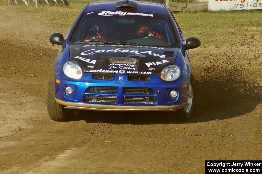 Cary Kendall / Scott Friberg throw gravel on SS1 at the Bemidji Speedway in their Dodge SRT-4.