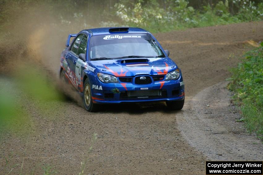 Otis Dimiters / Alan Ockwell at speed on SS2 in their Subaru WRX STi.