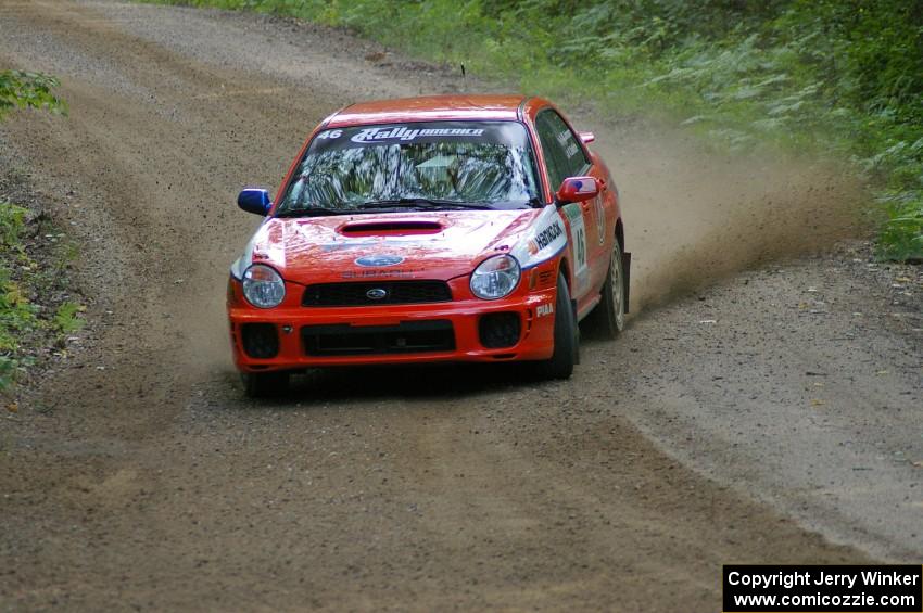 Matthew Johnson / Kim DeMotte Subaru WRX sets up for a left-hander near the end of SS2.