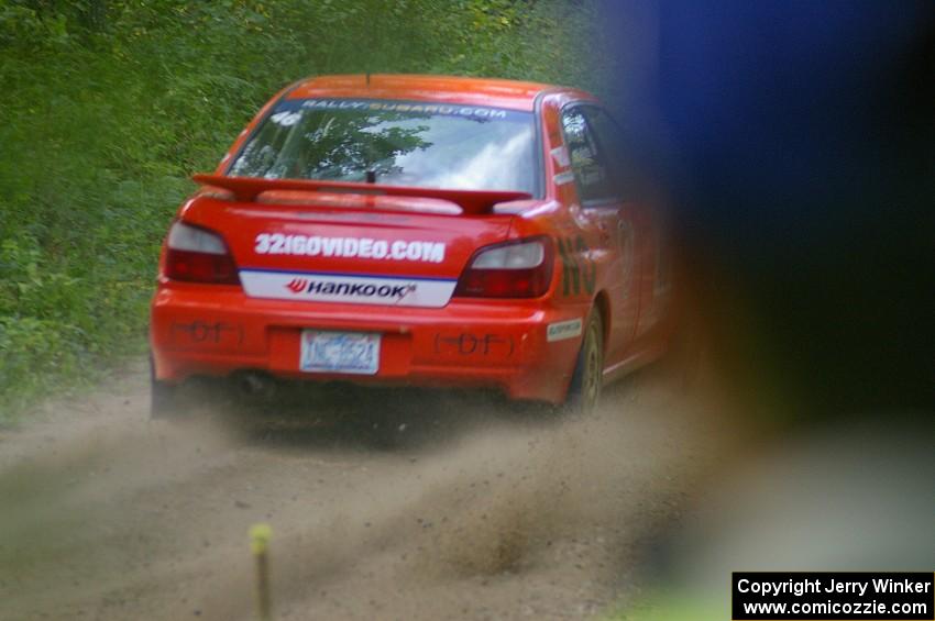 Matthew Johnson / Kim DeMotte Subaru WRX powers out of a left-hander near the end of SS2.