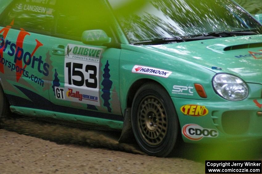 Eric Langbein / Jeremy Wimpey Subaru WRX at a fast left-hander on SS2.