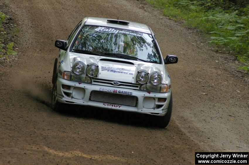 Henry Krolikowski / Cindy Krolikowski prepare for a fast left-hander on SS2 in their Subaru WRX.