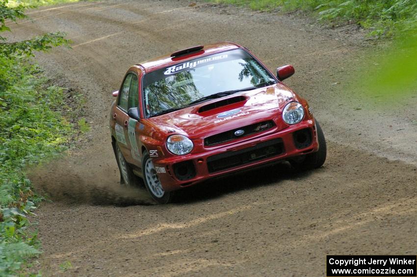 Dave Anton / Dominik Jozwiak set up their Subaru WRX STi for a fast left-hander on SS2.