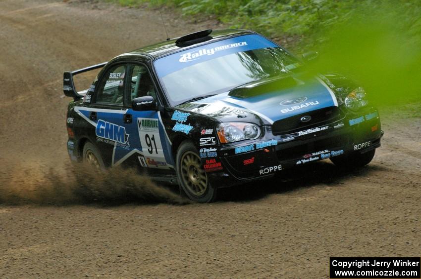 Jonathan Bottoms / Carolyn Bosley Subaru WTX STi comes into a fast left-hander on SS2.