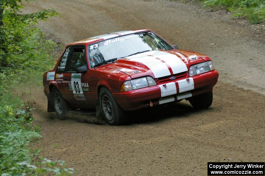 Mark Utecht / Rob Bohn at speed through a left-hander on SS2 in their Ford Mustang.