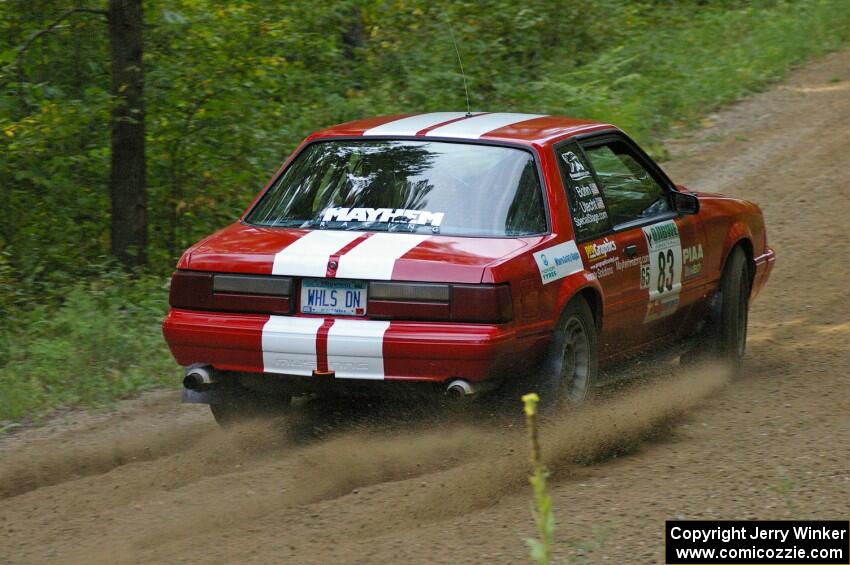 Mark Utecht / Rob Bohn exit a fast left-hander on SS2 in their Ford Mustang.