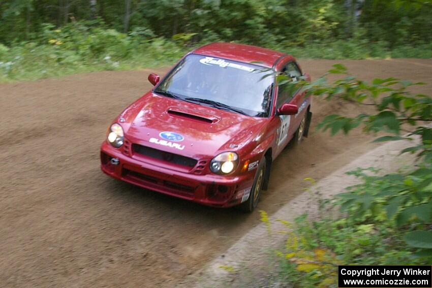 Bryan Pepp / Jerry Stang at a fast left-hander on SS2 in their Subaru WRX.