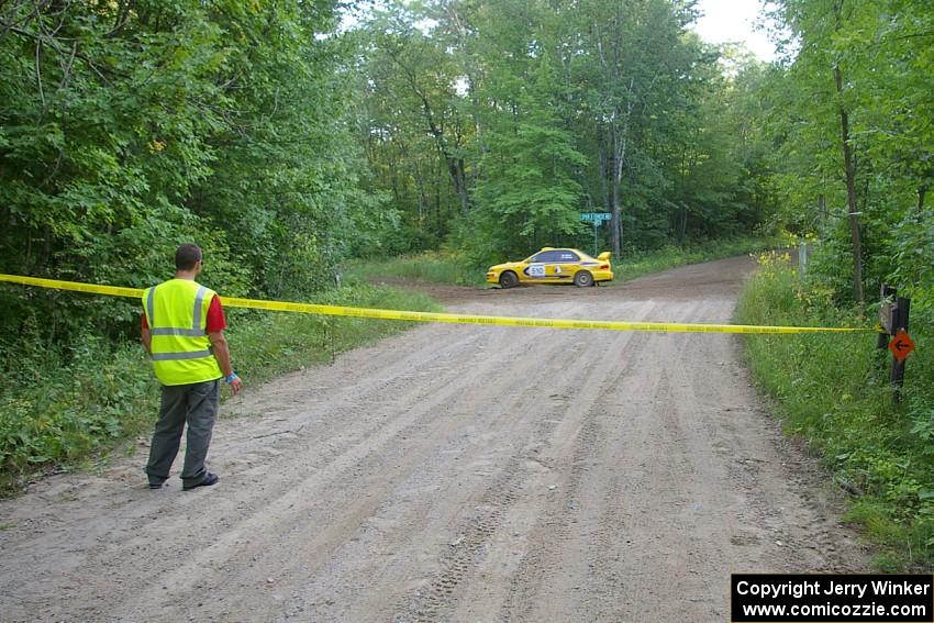 Mike Hurst / Russ Norton Subaru Impreza goes through a hairpin on SS3.