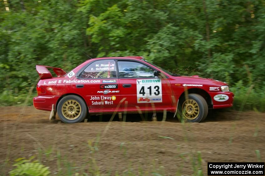 Erik Schmidt / Mike Rose get a little to wide at a hard right-hand hairpin on SS3 in their Subaru Impreza.