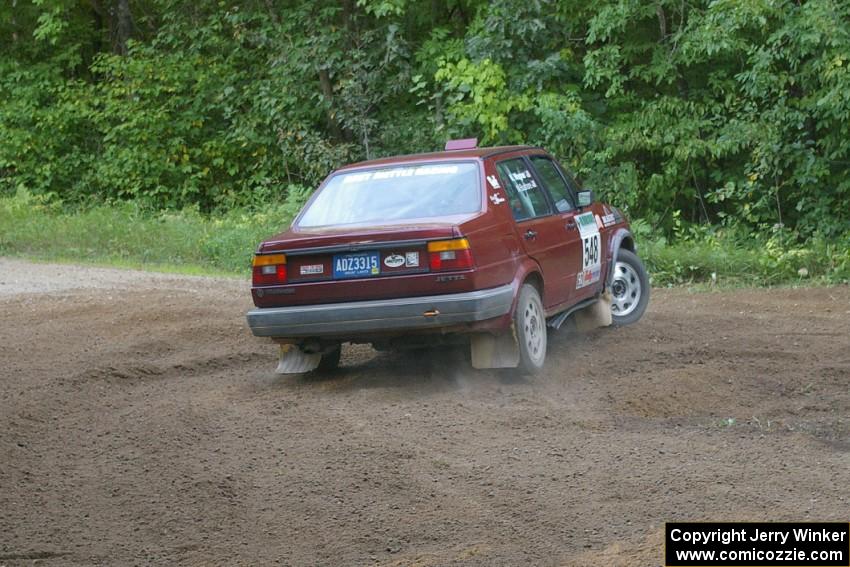 Matt Bushore / Karen Wagner carry too much speed in their VW Jetta at a tight hairpin on SS3.