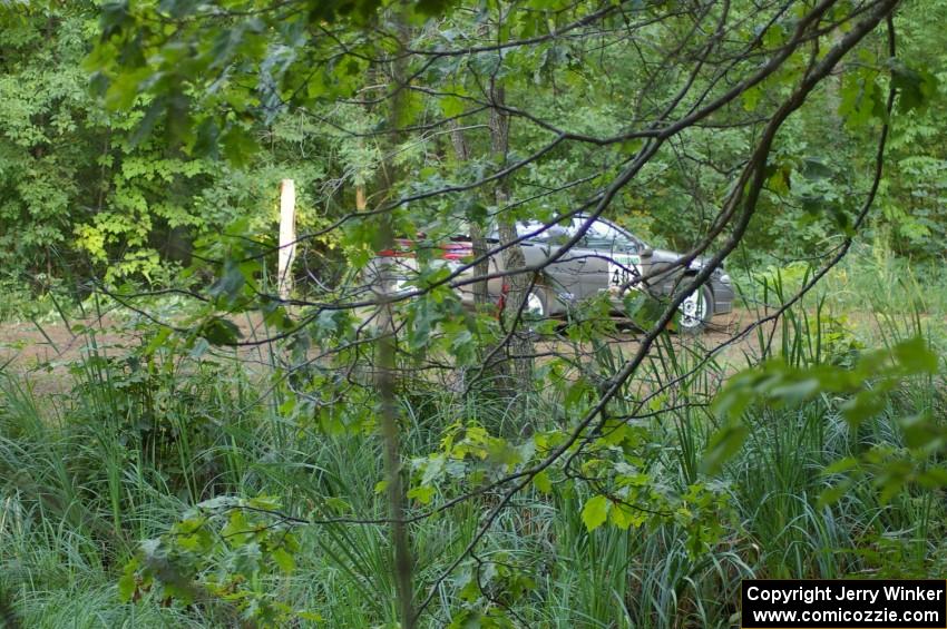 Erick Nelson / Greg Messler Plymouth	Laser through the trees at a hairpin on SS3.