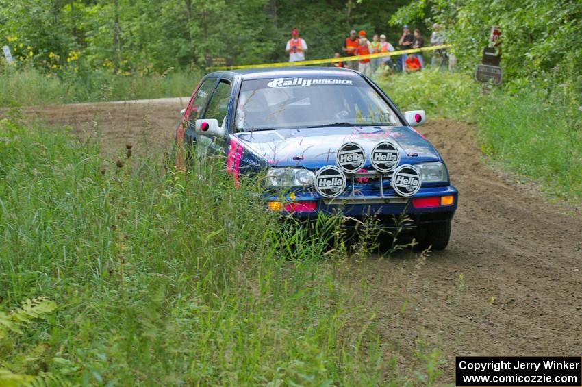 Kathy Jarvis / Martin Headland VW Golf take it easy coming out of a hairpin on SS3.