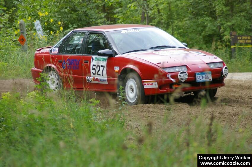 Jonah Liubakka / Craig Walli Saturn SL2 at a hairpin on SS3.