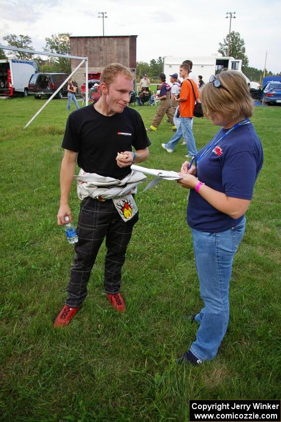 Bruce Davis steps out at Akeley service from the Dodge SRT-4 that he and Jimmy Brandt share.