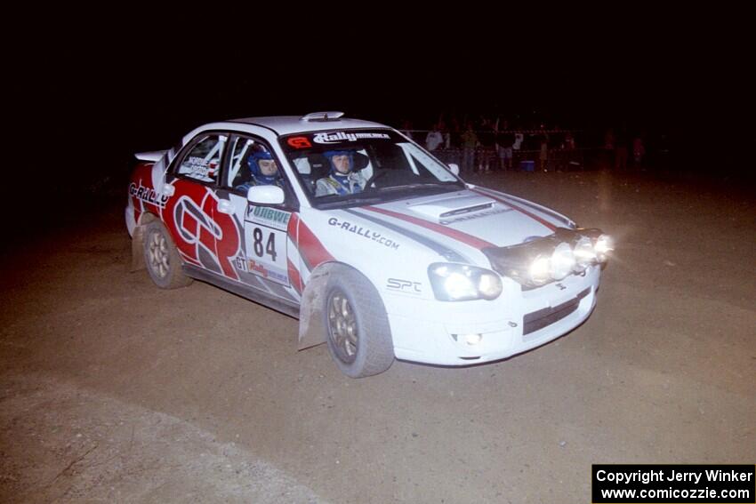 Greg Drozd / John Nordlie at speed as they power through a right-hander on SS8, Kabekona, in their Subaru WRX.