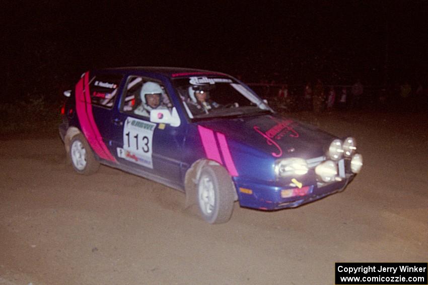 Kathy Jarvis / Martin Headland VW Golf at the spectator point on SS8, Kabekona.