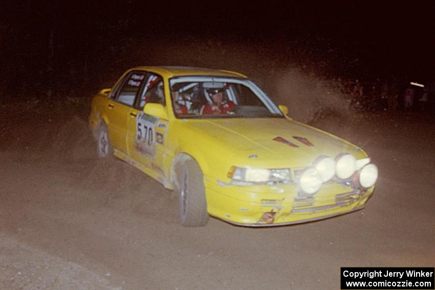 Erik Payeur / Adam Payeur Mitsubishi Galant at the spectator point on SS8, Kabekona.