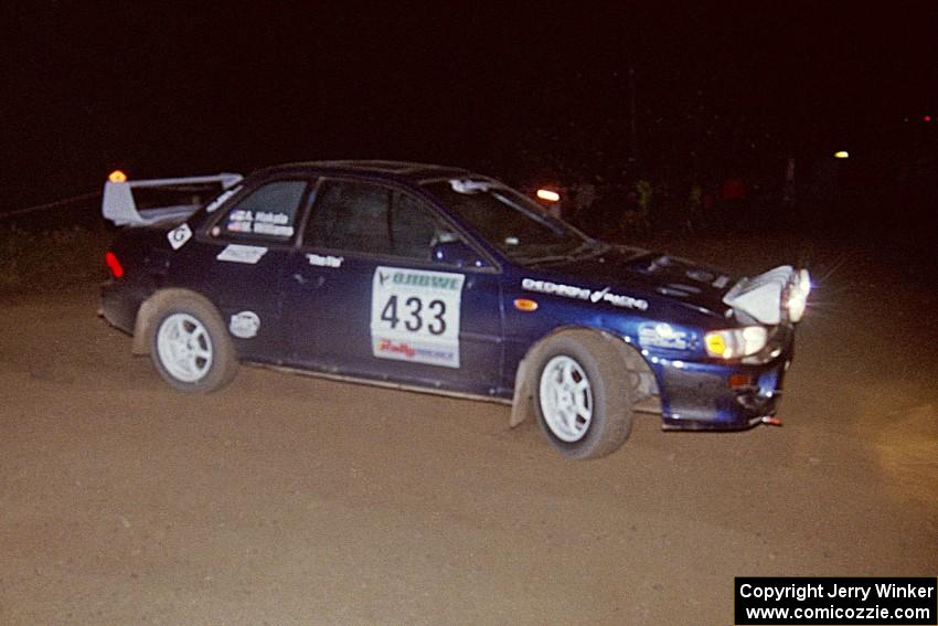 Mitch Williams / Alix Hakala Subaru Impreza at the spectator point on SS8, Kabekona.