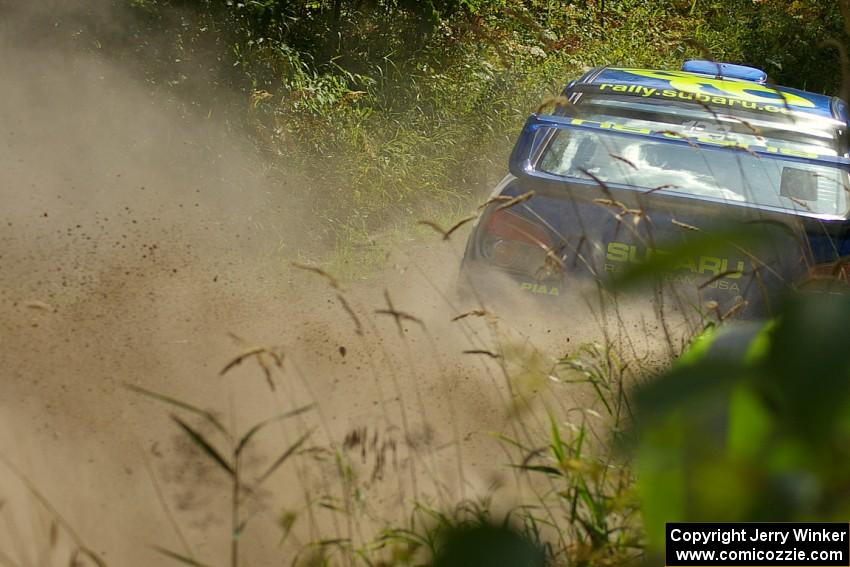 Travis Pastrana / Christian Edstrom Subaru WRX STi exits a left-hander on SS9.