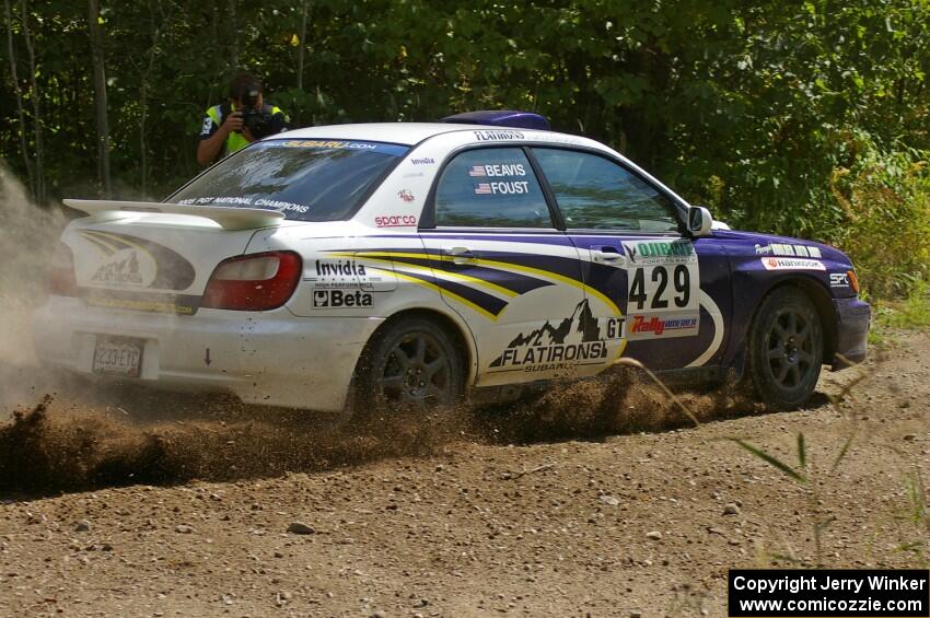 Tanner Foust / Chrissie Beavis Subaru WRX at a hard left-hander on SS9.