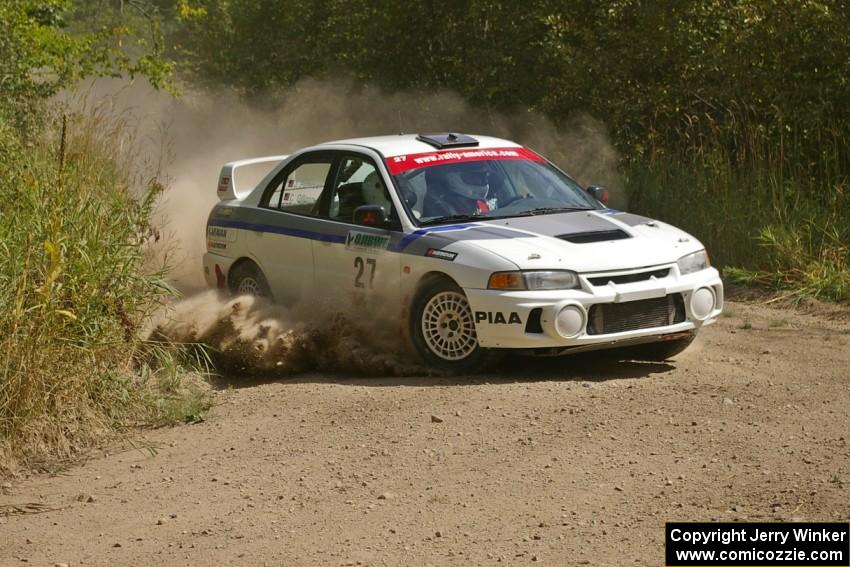 Chris Gilligan / Joe Petersen set up for a left-hander on SS9 in their Mitsubishi Lancer Evo IV.