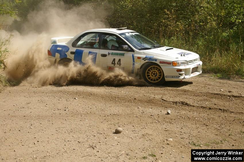 Henry Krolikowski / Cindy Krolikowski at a left-hander on SS9 in their Subaru WRX.