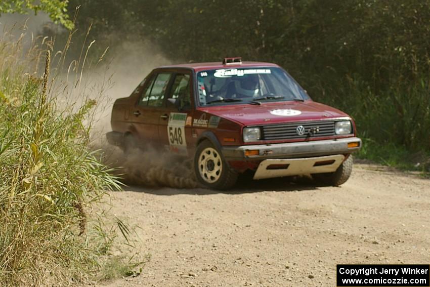 Matt Bushore / Karen Wagner prepare for a 90-left on SS9 in their VW Jetta.