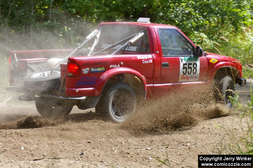 Jim Cox / Chris Stark hits the gas coming out of a left-hander on SS9 in their Chevy S-10.