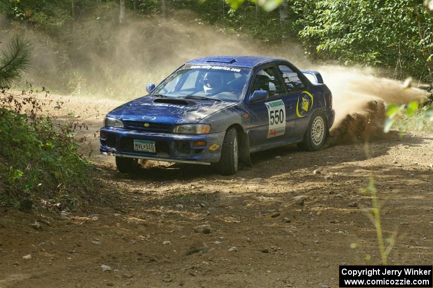 Kyle Sarasin / Stuart Sarasin do a beautiful job of drifting the car through a 90-right in their Subaru Impreza on SS13.