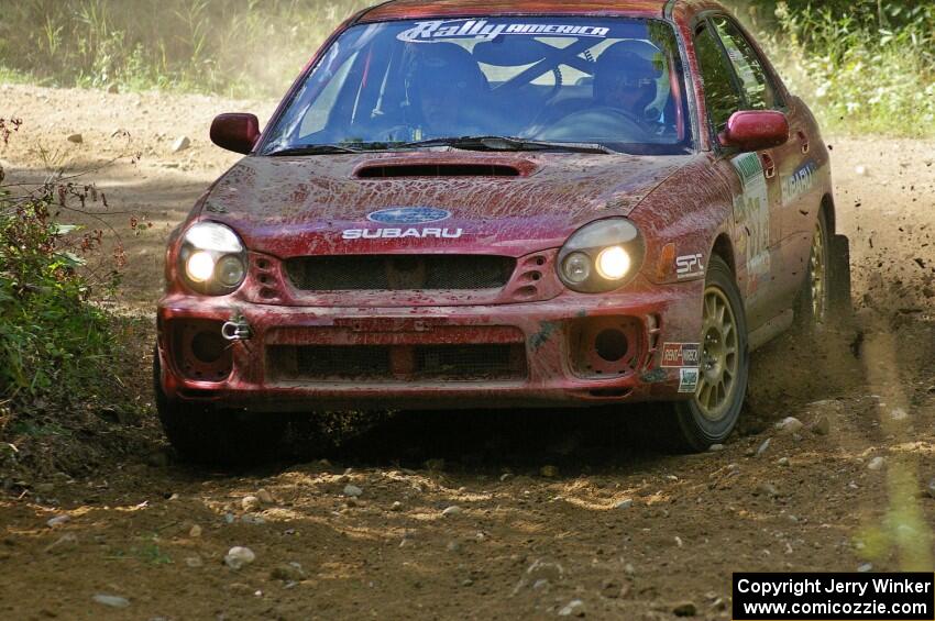 Bryan Pepp / Jerry Stang at a 90-right on SS13 in their Subaru WRX.