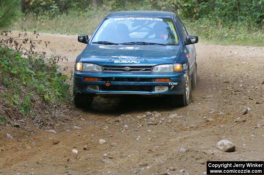 Martin Menning / Ryan Schnell Subaru Impreza at a left-hander on SS9.