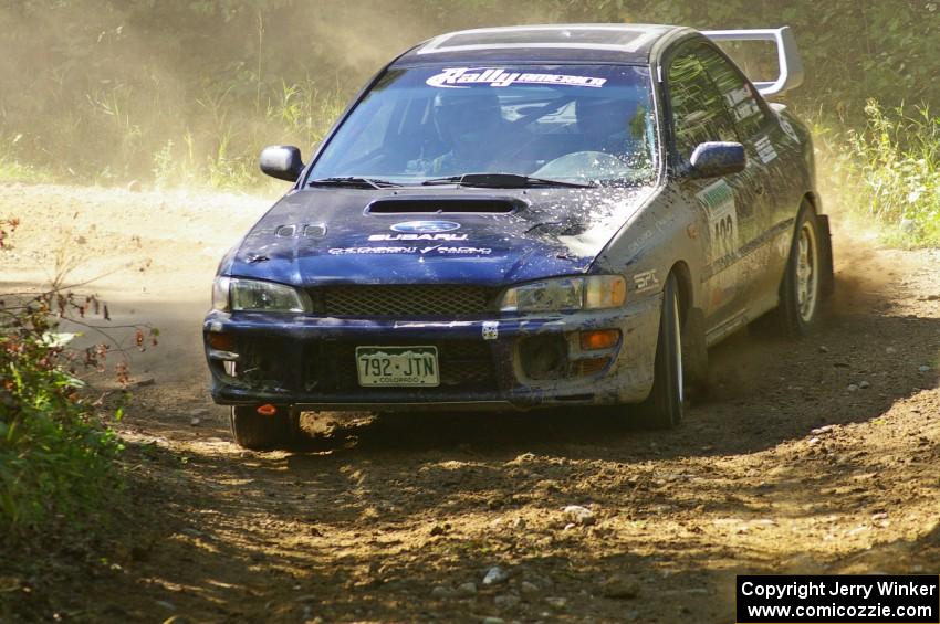 Mitch Williams / Alix Hakala Subaru Impreza at a 90-right on SS13.