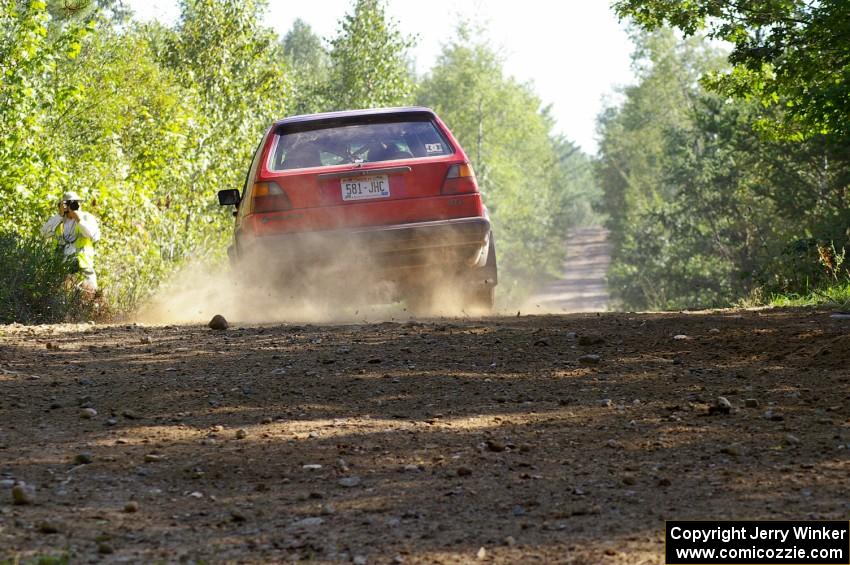 Paul Koll / Matt Wappler VW GTI at an uphill right on SS13.