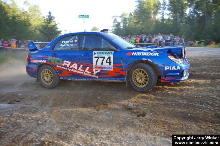 Otis Dimiters / Alan Ockwell at the SS14 spectator point at the county road in their Subaru WRX STi.