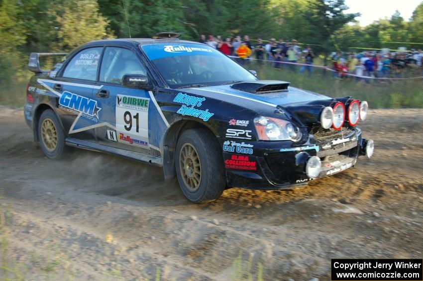 Jonathan Bottoms / Carolyn Bosley Subaru WTX STi at the spectator point on SS14.