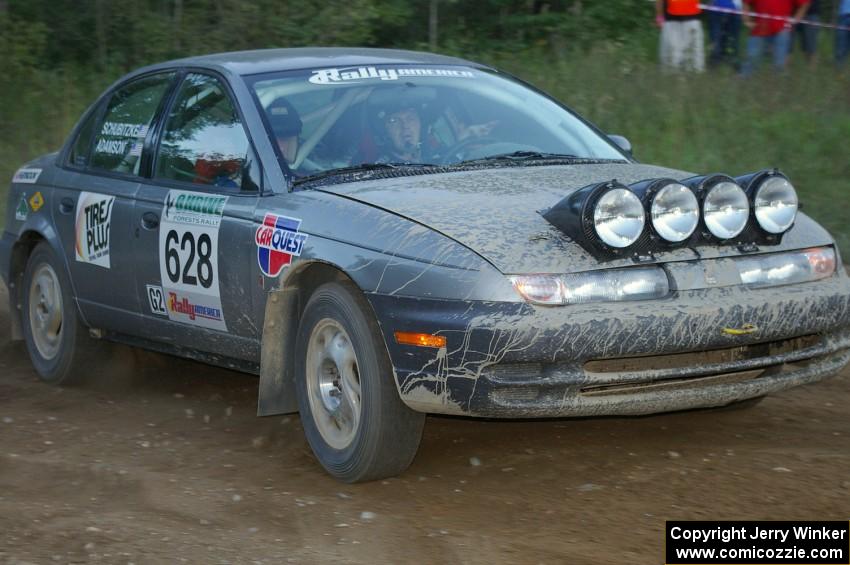 Dan Adamson / Jeremiah Schubitzke at the spectator point on SS14 in their Saturn SL2.