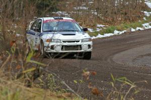 Chris Gilligan / Joe Petersen head uphill through the first few corners on Herman, SS1, in their Mitsubishi Lancer Evo IV.