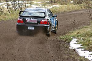 Jonathan Bottoms / Carolyn Bosley kick the back end around and reapply the power on their Subaru WRX STi on SS1, Herman.